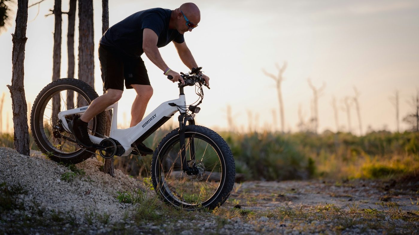E-bike being ridden in a hilly or outdoor setting
